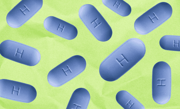 Blue oval pills with an embossed 'H' are scattered across a green background.
