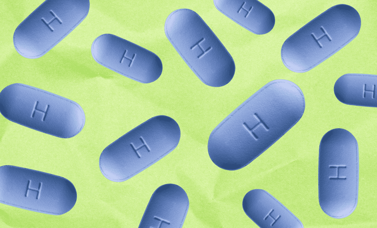Blue oval pills with an embossed 'H' are scattered across a green background.